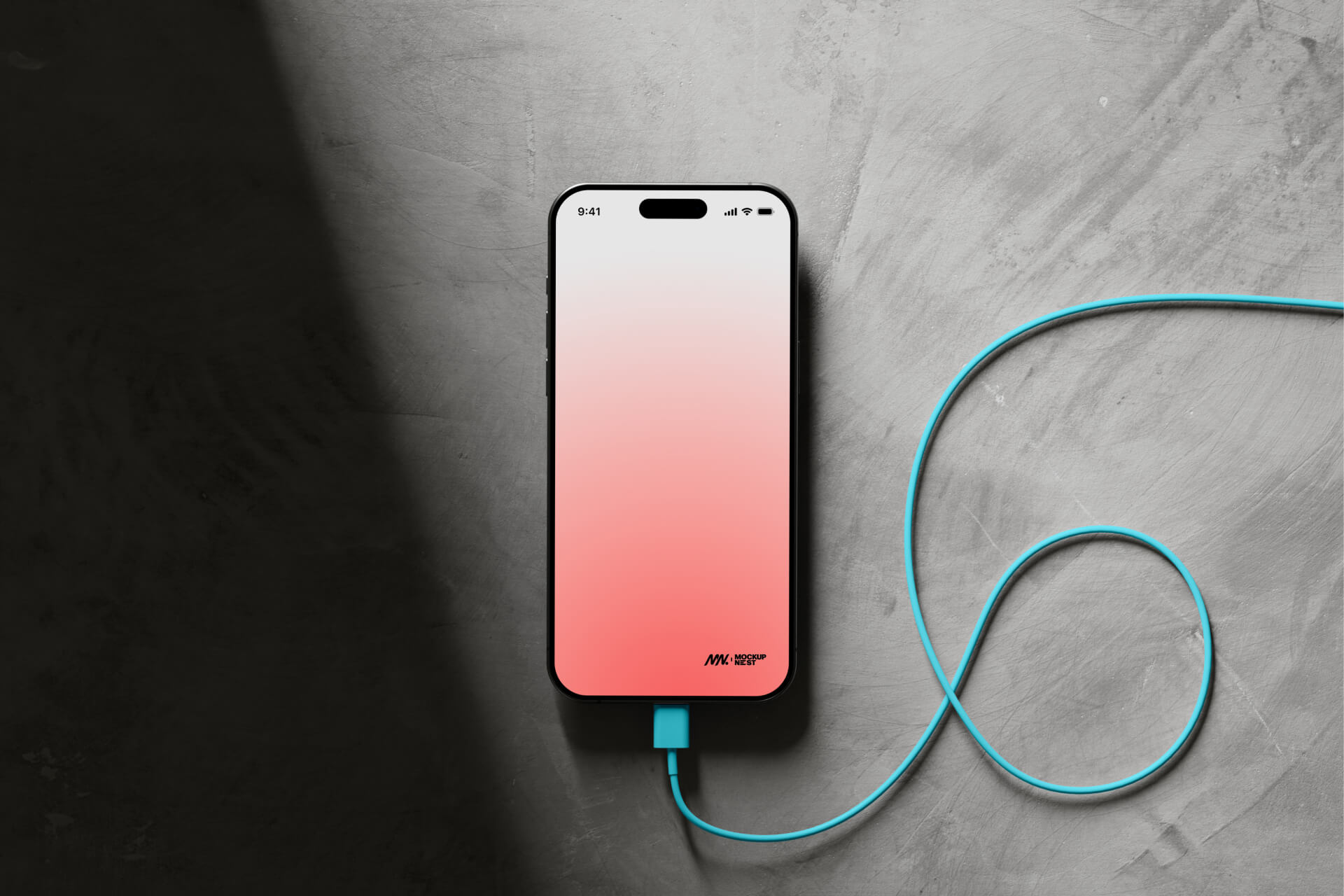 iPhone 15 Pro mockup with a coral gradient screen on concrete